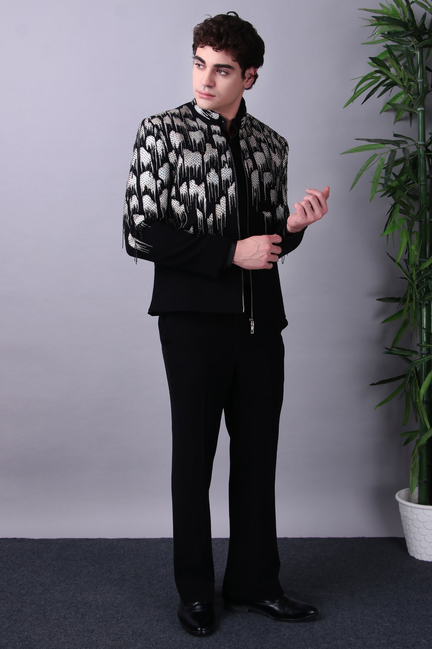 Onyx bandhgala set, front, hand at chest