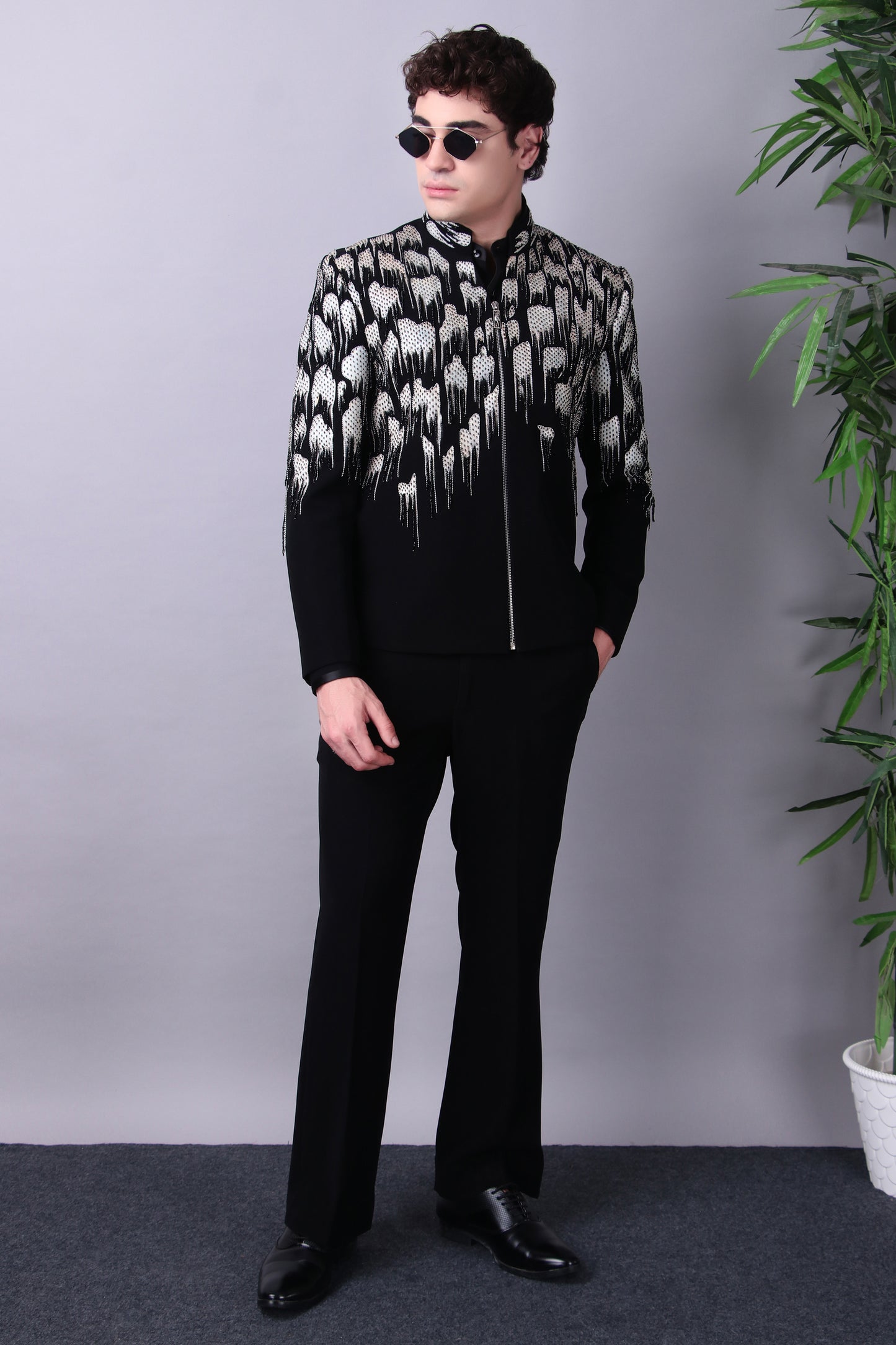 Onyx bandhgala set lifestyle full-body shot with sunglasses